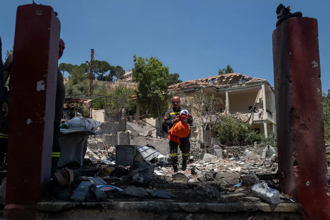 In Lebanon, first responders salvage memories from debris of destroyed HQ