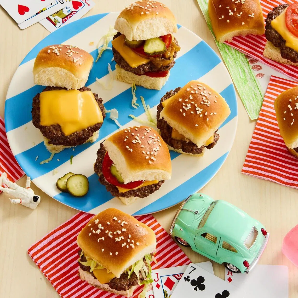 HEADLINE: Sliding Toward Summer
CAPTION: Cheeseburger Sliders. End-of-school year chaos has arrived. These 20-minute (or less) meals will get you cooking through it. Food styled by Monica Pierini. Prop styled by Megan Hedgpeth.
CREDIT: (Ryan Liebe/The New York Times)
