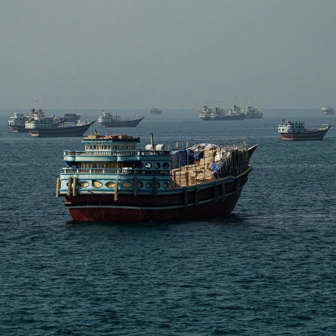 Vessels anchored in the Strait of Hormuz, as seen from Musandam, Oman, on May 29.
