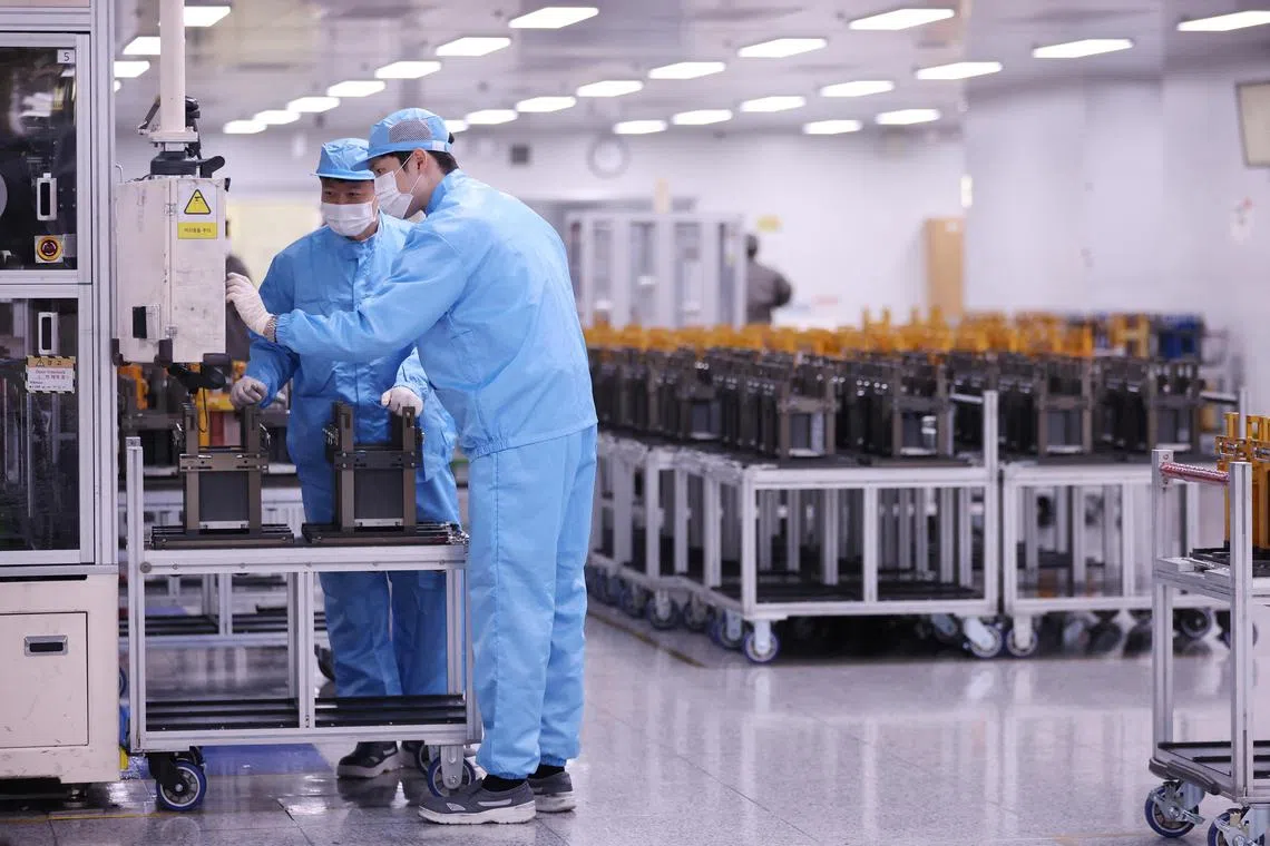 Employees work at SK On EV battery factory in Seosan, South Korea, October 19, 2023.  REUTERS/Kim Hong-Ji