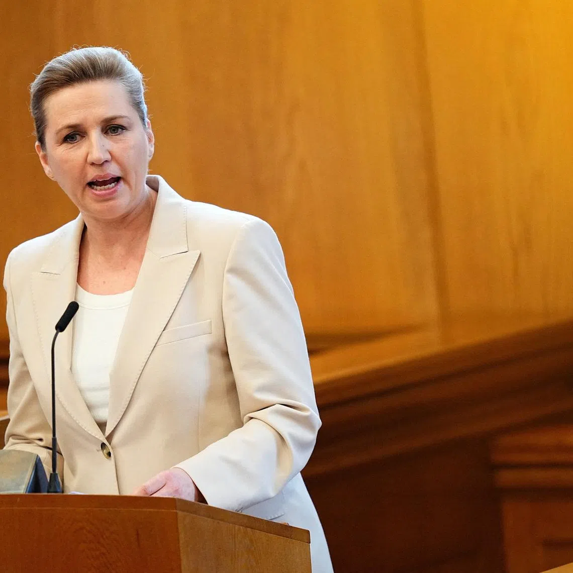 Danish Prime Minister Mette Frederiksen speaks on the day she announced that Denmark will hold a parliamentary election on March 24, in the Parliament Hall at Christiansborg in Copenhagen, Denmark February 26, 2026. Ritzau Scanpix/Thomas Traasdahl via REUTERS