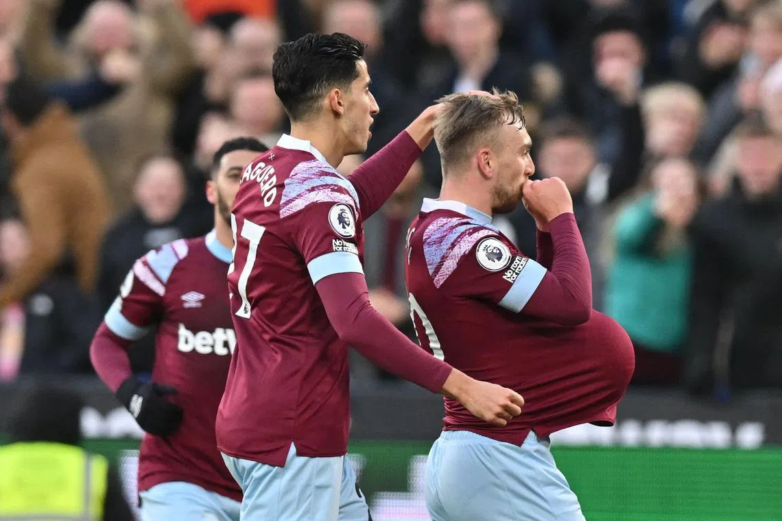 West Ham United's Jarrod Bowen (right) celebrates with teammates after scoring the opening goal.