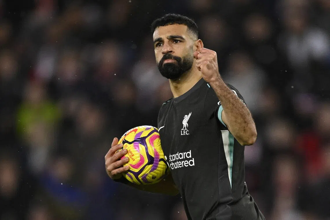 Liverpool's Mohamed Salah celebrates scoring their second goal.