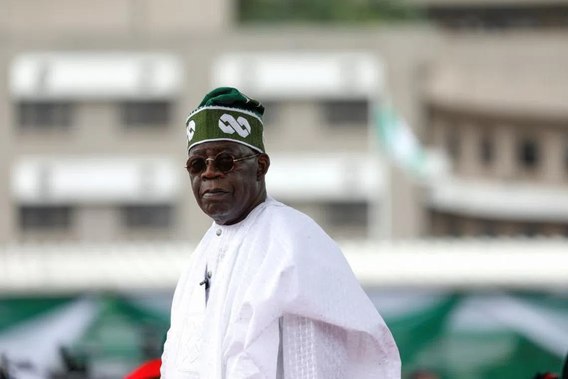 FILE PHOTO: Nigeria's President Bola Tinubu looks on after his swearing-in ceremony in Abuja, Nigeria May 29, 2023. REUTERS/Temilade Adelaja