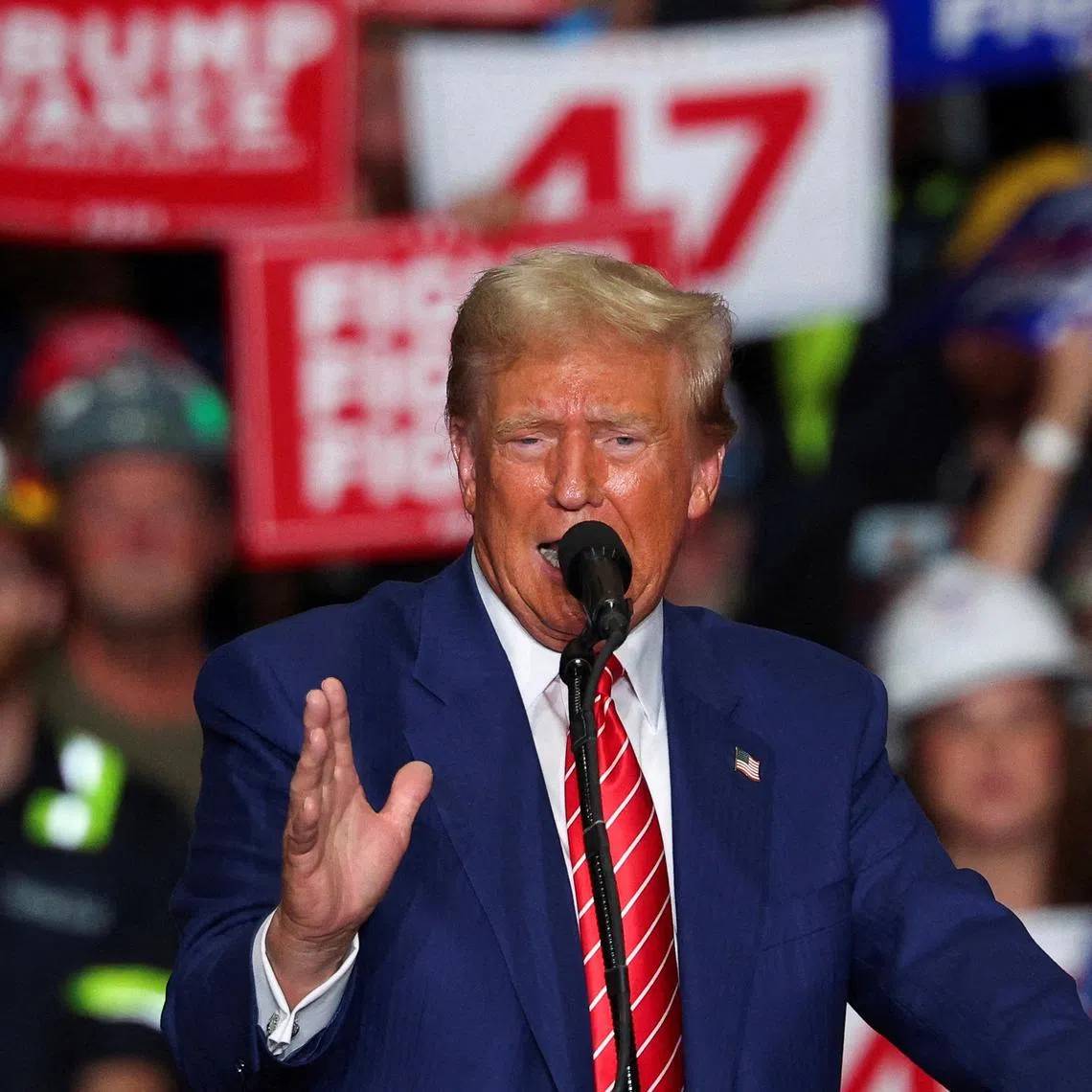 FILE PHOTO: Republican presidential nominee and former U.S. President Donald Trump speaks as he holds a rally at the Cambria County War Memorial Arena in Johnstown, Pennsylvania, U.S. August 30, 2024. REUTERS/Brian Snyder/File Photo