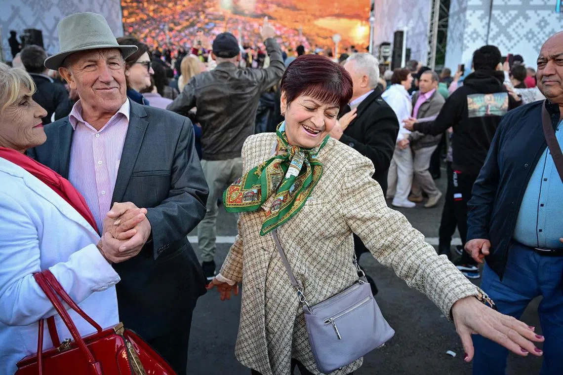 People dance during a feast organised for the celebration of the city of Chisinau. Although Moldova is known for its wine industry and Orthodox monasteries, it is one of Europe’s least visited countries.