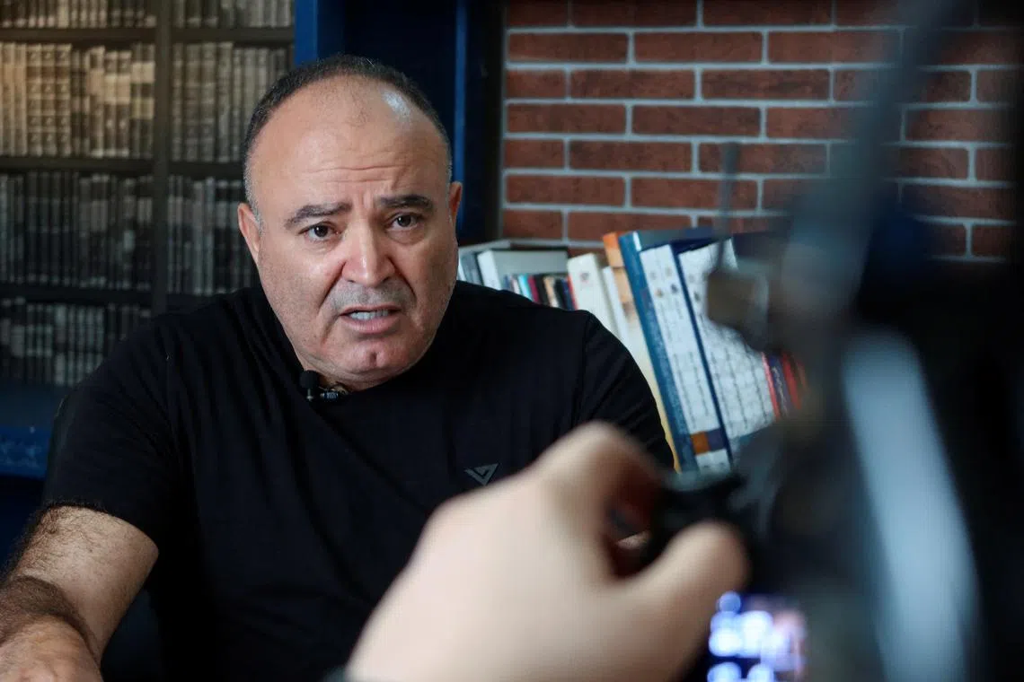 FILE PHOTO: Tunisian prominent journalist Mohamed Boughalleb speaks during the filming of his show to broadcast via YouTube, in Tunis, Tunisia  September 30, 2022. REUTERS/Jihed Abidellaoui/File Photo