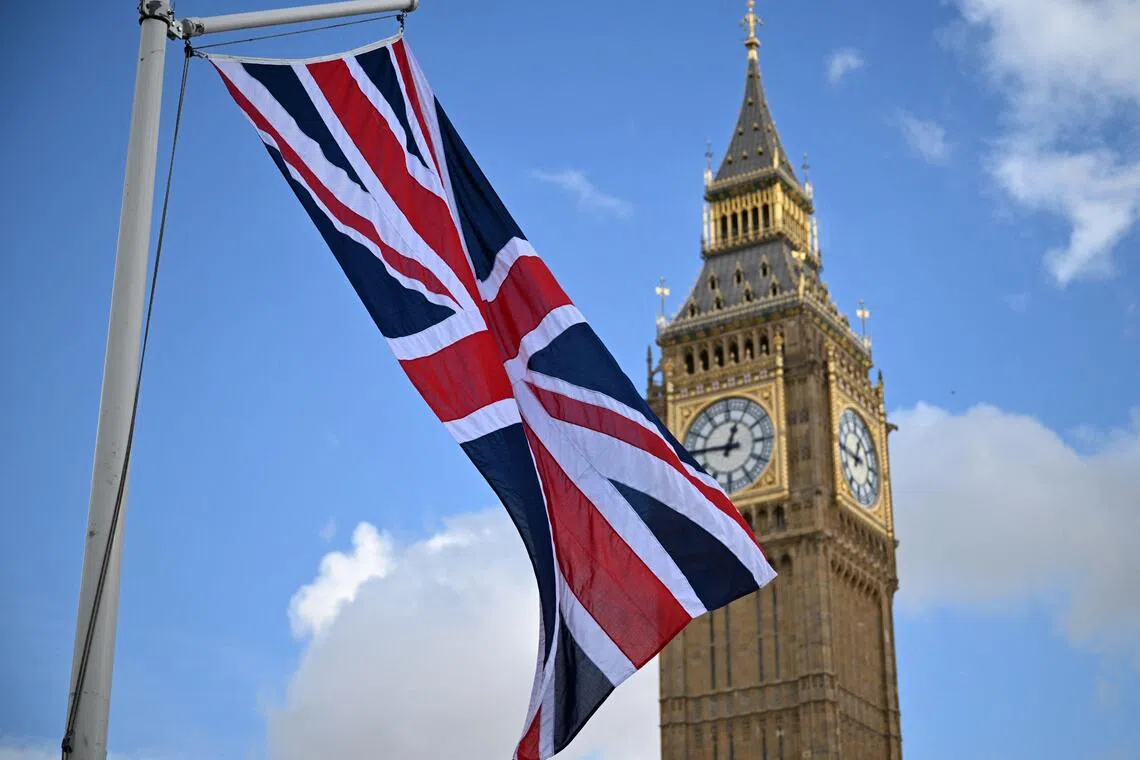 A British Union flag outside the Houses of Parliament in central London.