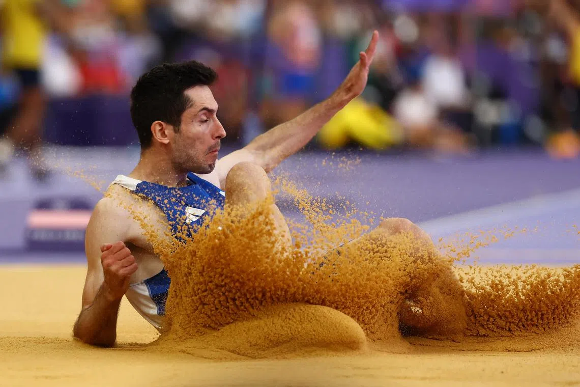 Paris 2024 Olympics - Athletics - Men's Long Jump Final - Stade de France, Saint-Denis, France - August 06, 2024.  Miltiadis Tentoglou of Greece reacts. REUTERS/Kai Pfaffenbach