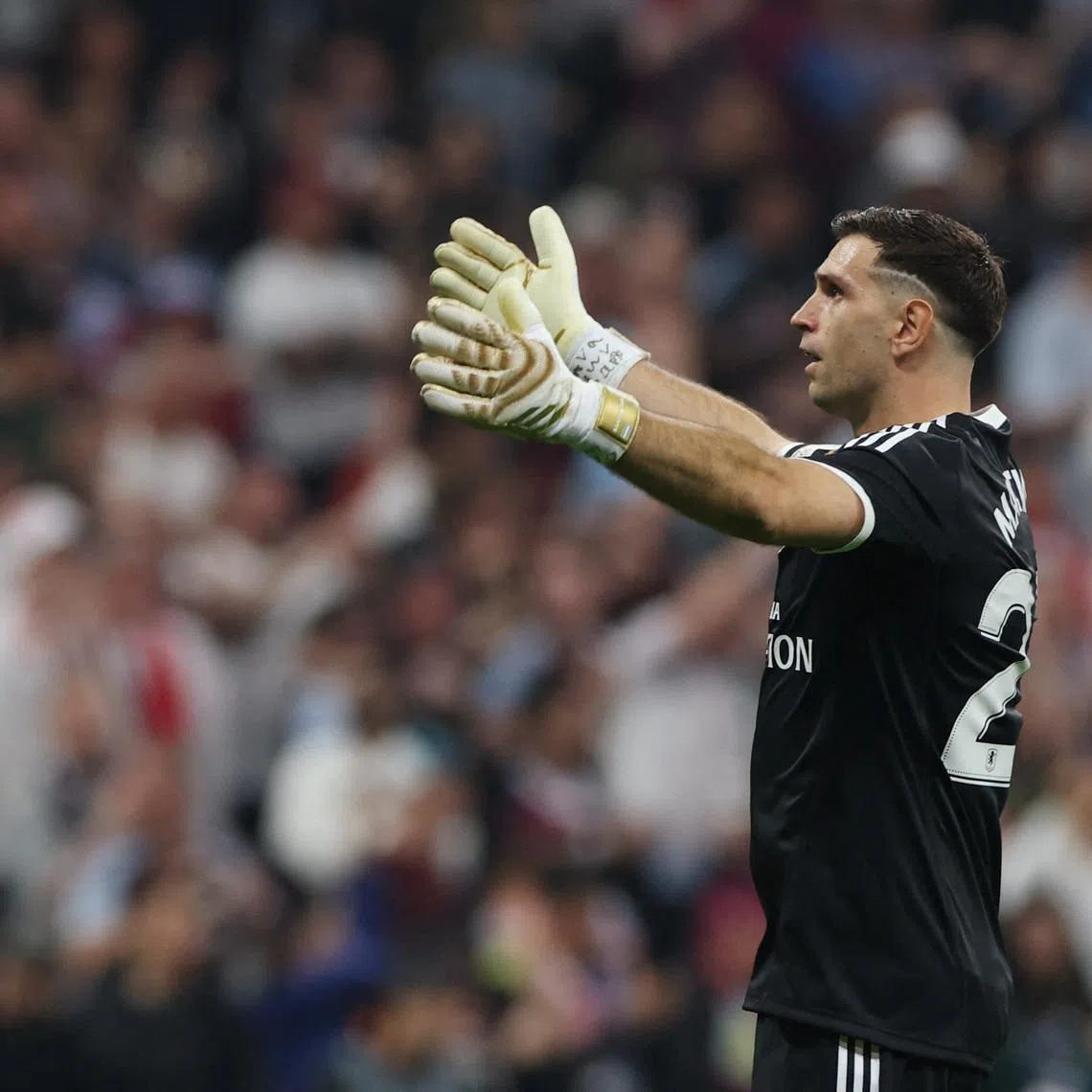 Soccer Football - UEFA Europa League - Final - SC Freiburg v Aston Villa - Besiktas Park, Istanbul, Turkey - May 20, 2026 Aston Villa's Emiliano Martinez celebrates after Youri Tielemans scores their first goal REUTERS/Umit Bektas