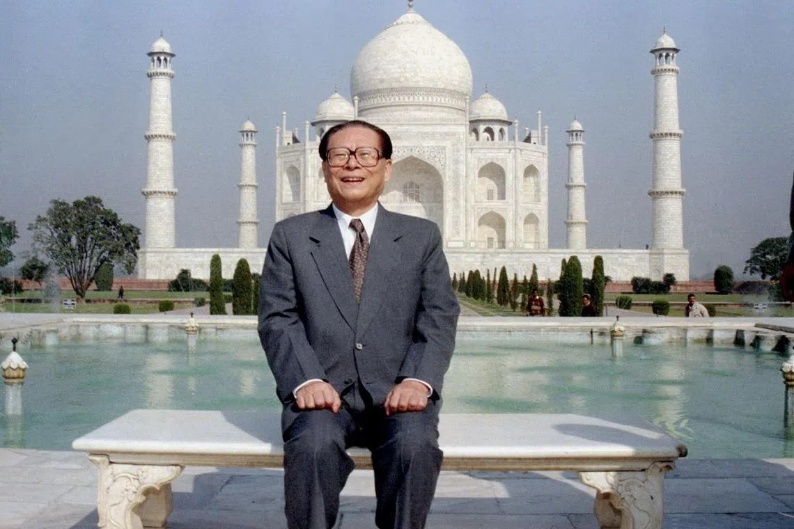 Jiang Zemin posing for a photo in front of the Taj Mahal in Agra, India, on Nov 30, 1996. 