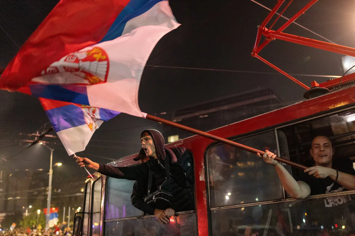 Supporters of the electoral list \"Student List - Students Win\" celebrate after Aleksandar Vucic, Serbian Progressive Party (SNS) prime ministerial candidate, conceded defeat in the parliamentary election in Belgrade, Serbia, October 26, 2026. REUTERS/Uros Arsic