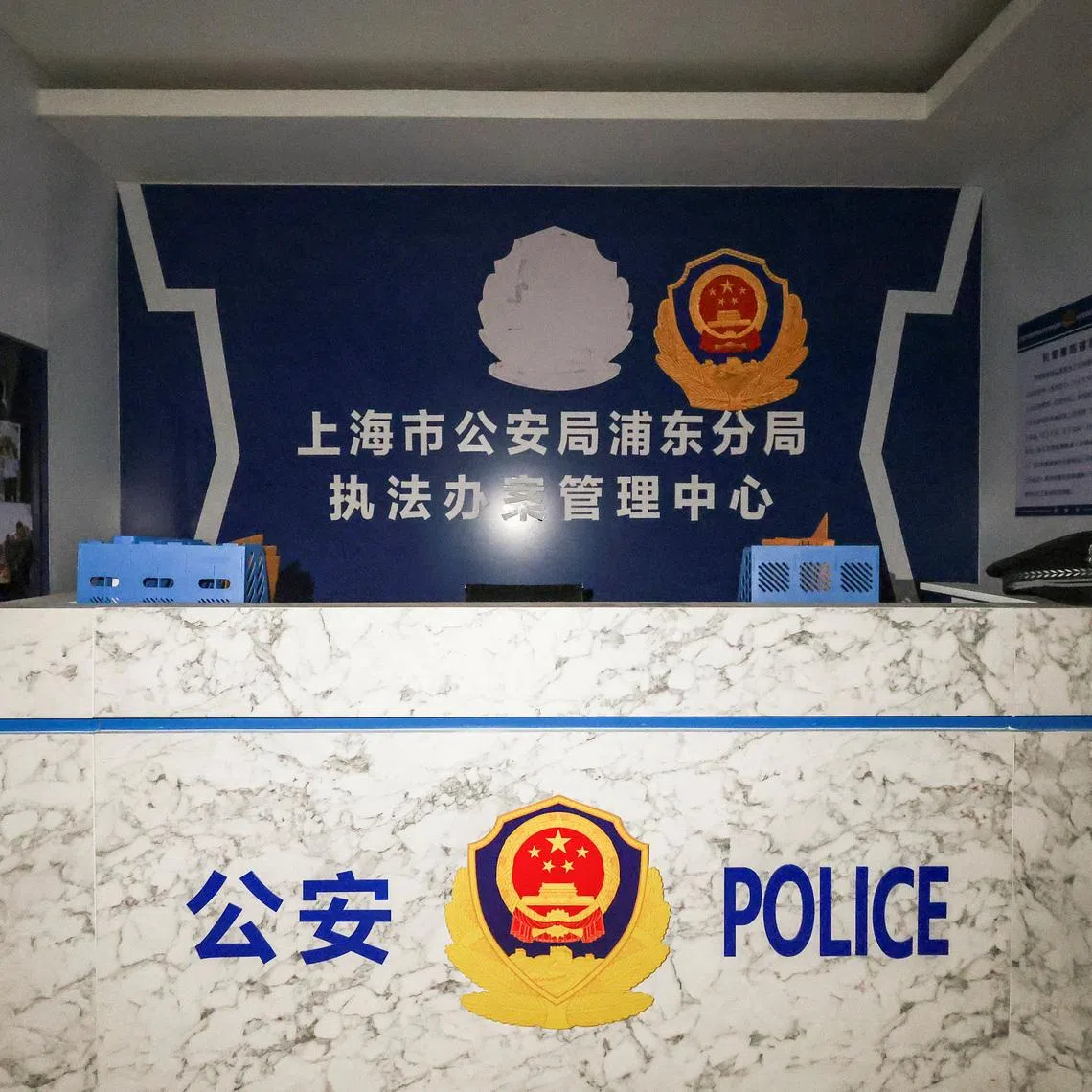A room set up to imitate a Chinese police station inside the O'Smach casino, a compound used for scam operations at the Chong Chom-O'Smach border crossing, following clashes between Thailand and Cambodia along a disputed border area, in Samraong, Oddar Meanchey province, Cambodia, February 2, 2026. REUTERS/Chalinee Thirasupa