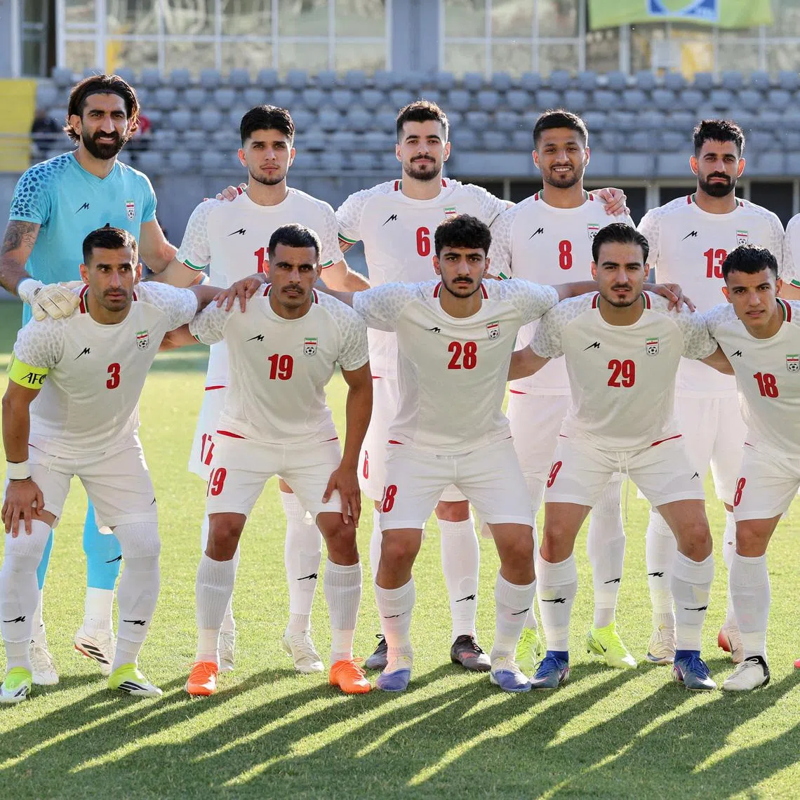 Iran players pose for a team group photo before the match with Gambia on May 29.