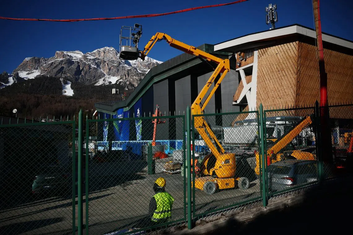 Milano Cortina 2026 Winter Olympics - Previews - Cortina d'Ampezzo, Italy - January 21, 2026 General view outside the Cortina Curling Olympic Stadium as workers prepare ahead of the Milano Cortina 2026 Winter Olympics REUTERS/Guglielmo Mangiapane
