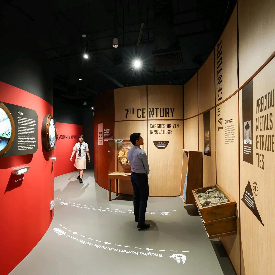 ST20250317_202580400360/vcgallery17/Brian Teo/Vanessa Paige Chelvan/Visitors exploring the newly refreshed Singapore Maritime Gallery at Marina South Pier on March 17, 2025. This section is part of the new maritime heritage zone, ?Tides of Time,? which traces Singapore?s maritime history back to the 3rd century and examines the role of maritime trade in the nation's growth and development. ST PHOTO: BRIAN TEO