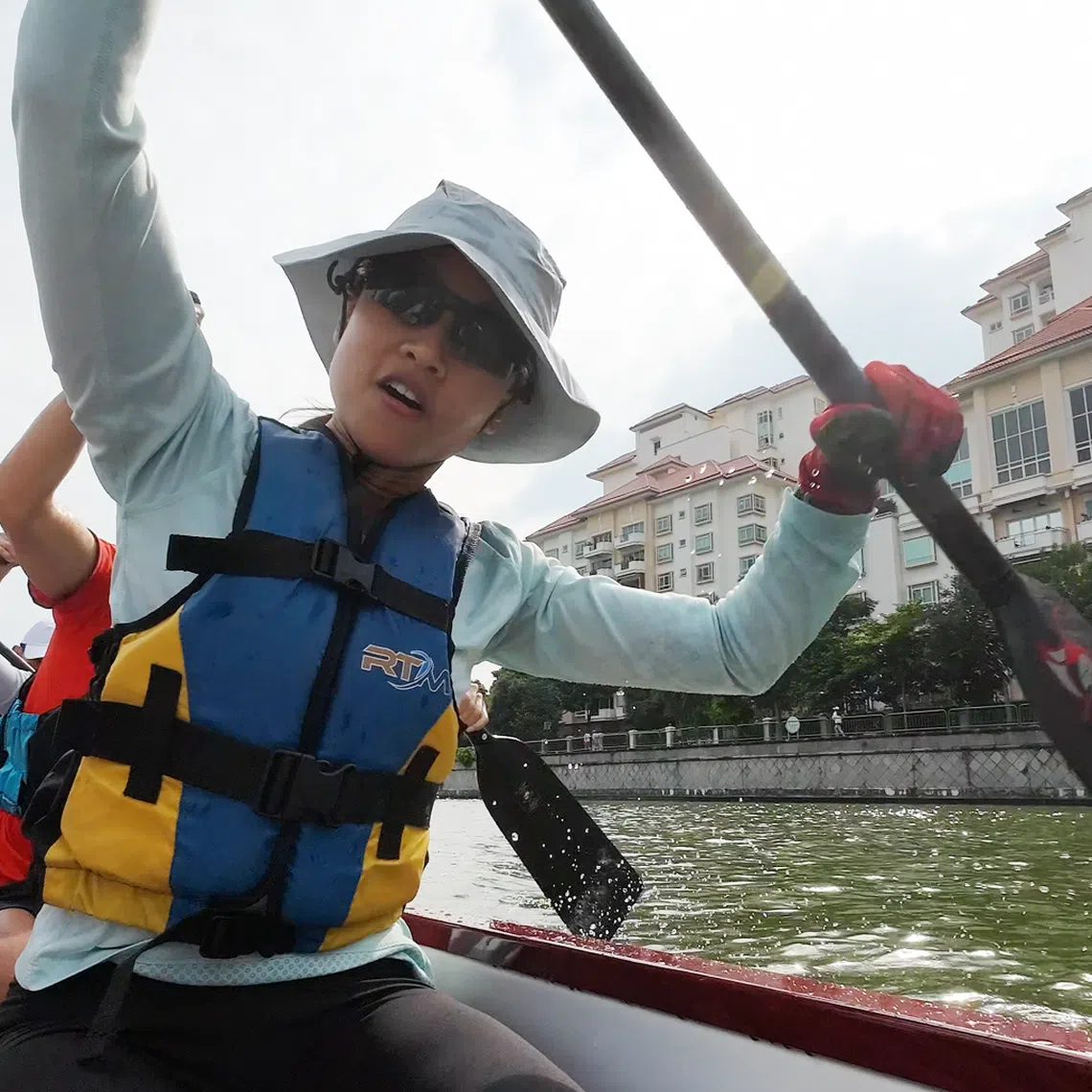 programme director at dso national laboratories winds down with dragon boat team, one of the firm’s many common interest groups, best employers singapore