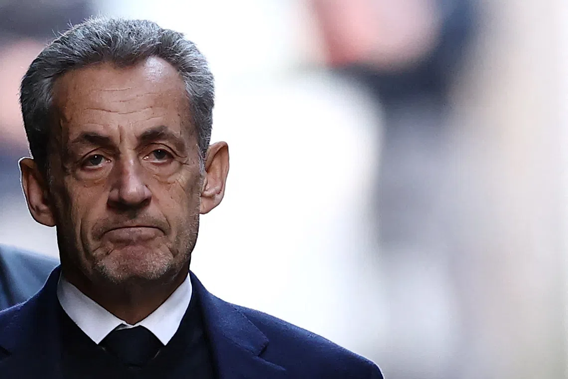 Former French President Nicolas Sarkozy leaves his house on the day of his incarceration at the Sante prison to begin his five-year prison sentence for criminal conspiracy over attempts to raise campaign funds from Libya, in Paris, France, October 21, 2025. REUTERS/Sarah Meyssonnier