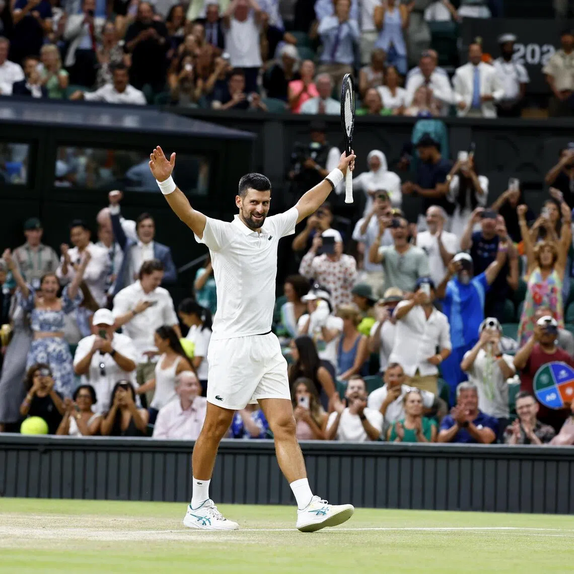 epa13096638 Novak Djokovic of Serbia celebrates after winning his Men's Singles quarter final match against Felix Auger Aliassime of Canada at the Wimbledon Championships in London, Britain, 07 July 2026.  EPA/TOLGA AKMEN