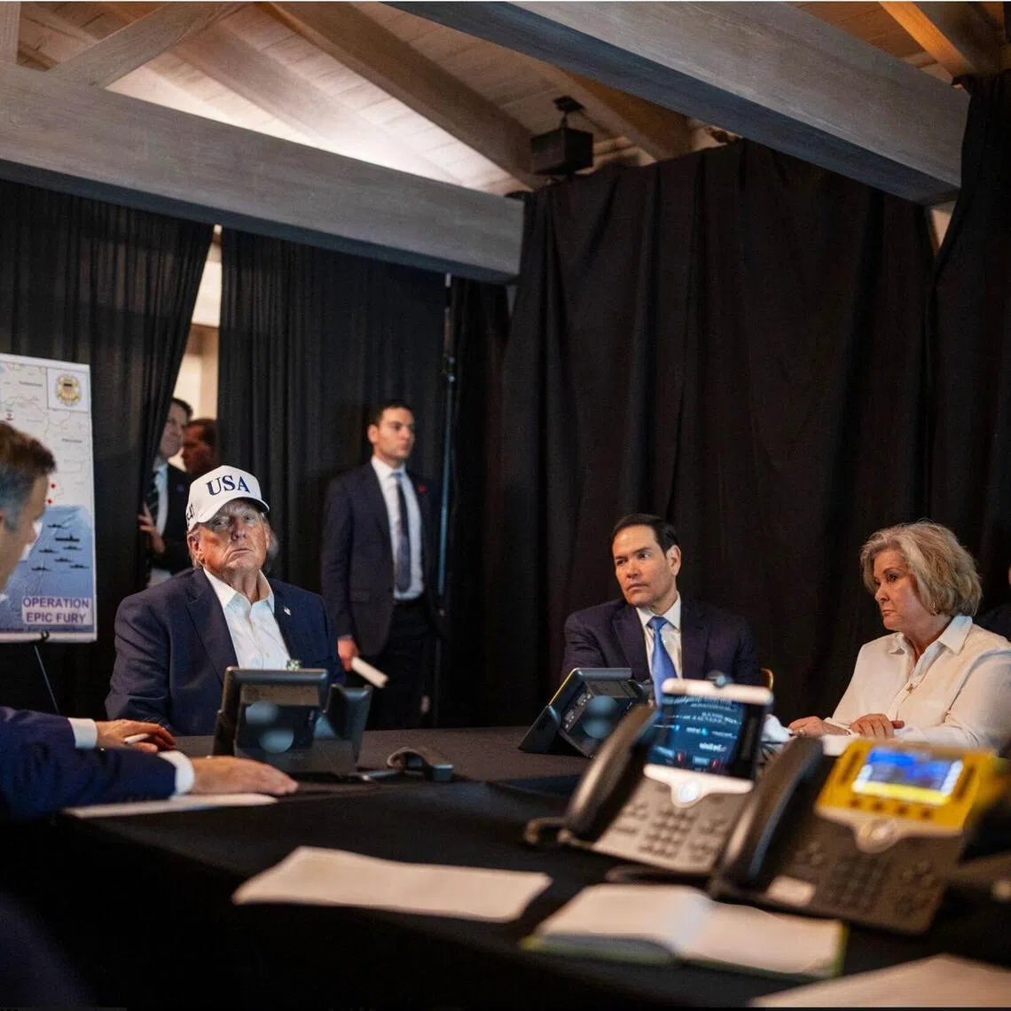 This official White House photograph, made available on February 28, 2026, and released on the White House X account, shows US President Donald Trump (2L), US Secretary of State Marco Rubio (3R) and White House Chief of Staff Susie Wiles (2R) monitoring activity related to “Operation Epic Fury” against Iran from an unnamed location on February 28, 2026. US President Donald Trump said February 28 that Iranian supreme leader Ayatollah Ali Khamenei has been killed in air strikes, though there has been no confirmation from Tehran. Khameini, one of the most evil people in History, is dead, Trump said on his Truth Social network. (Photo by The White House / AFP) / RESTRICTED TO EDITORIAL USE - MANDATORY CREDIT AFP PHOTO / THE WHITE HOUSE  - HANDOUT - NO MARKETING NO ADVERTISING CAMPAIGNS - DISTRIBUTED AS A SERVICE TO CLIENTS
