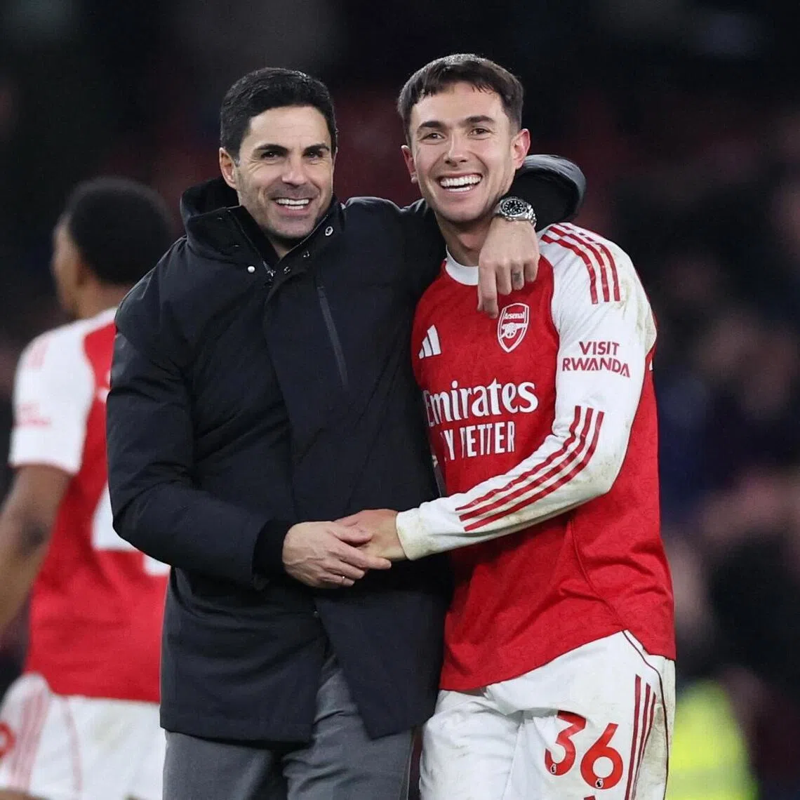 Arsenal manager Mikel Arteta and Martin Zubimendi celebrate after the match.