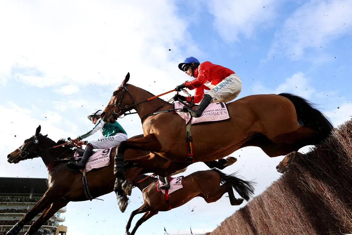 Horse Racing - Cheltenham Festival - Cheltenham Racecourse, Cheltenham, Britain - March 13, 2026  Envoi Allen ridden by Darragh O'Keeffe in action during the 16:00 Boodles Cheltenham Gold Cup Chase Action Images via Reuters/Paul Childs