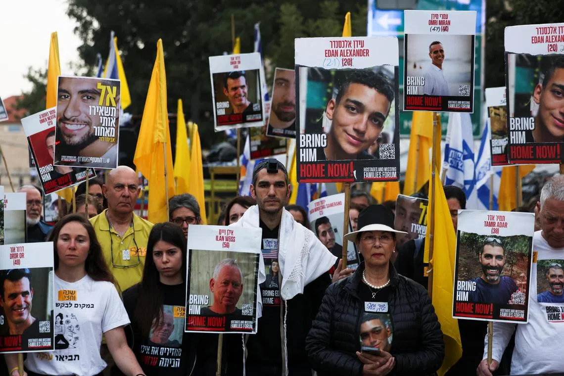 Supporters of Israeli hostages kidnapped during the Oct 7, 2023 attack on Israel by Hamas, take part in a protest to mark a year and a half since the deadly October 7 attack by Hamas, in Jerusalem, on April 7, 2025.