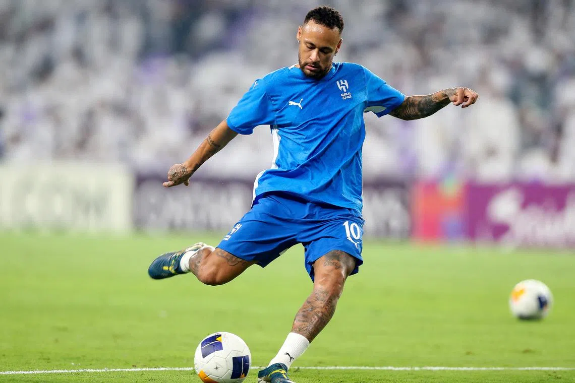 Soccer Football - Asian Champions League - Group B - Al Ain v Al Hilal - Hazza bin Zayed Stadium, Al Ain, United Arab Emirates - October 21, 2024 Al Hilal's Neymar during the warm up before the match REUTERS/Walid Zain/File Photo