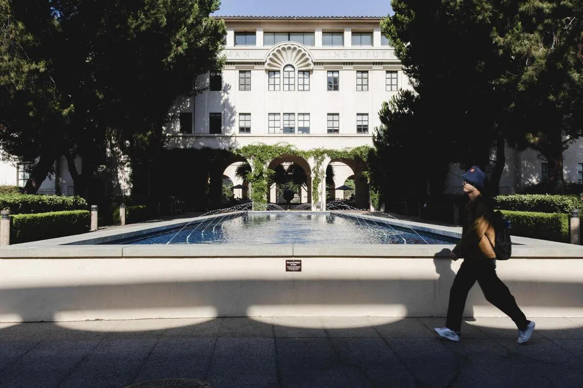A person walks past the Gene Pool on the campus of the California Institute of Technology in Pasadena, California, on Aug 2, 2024.