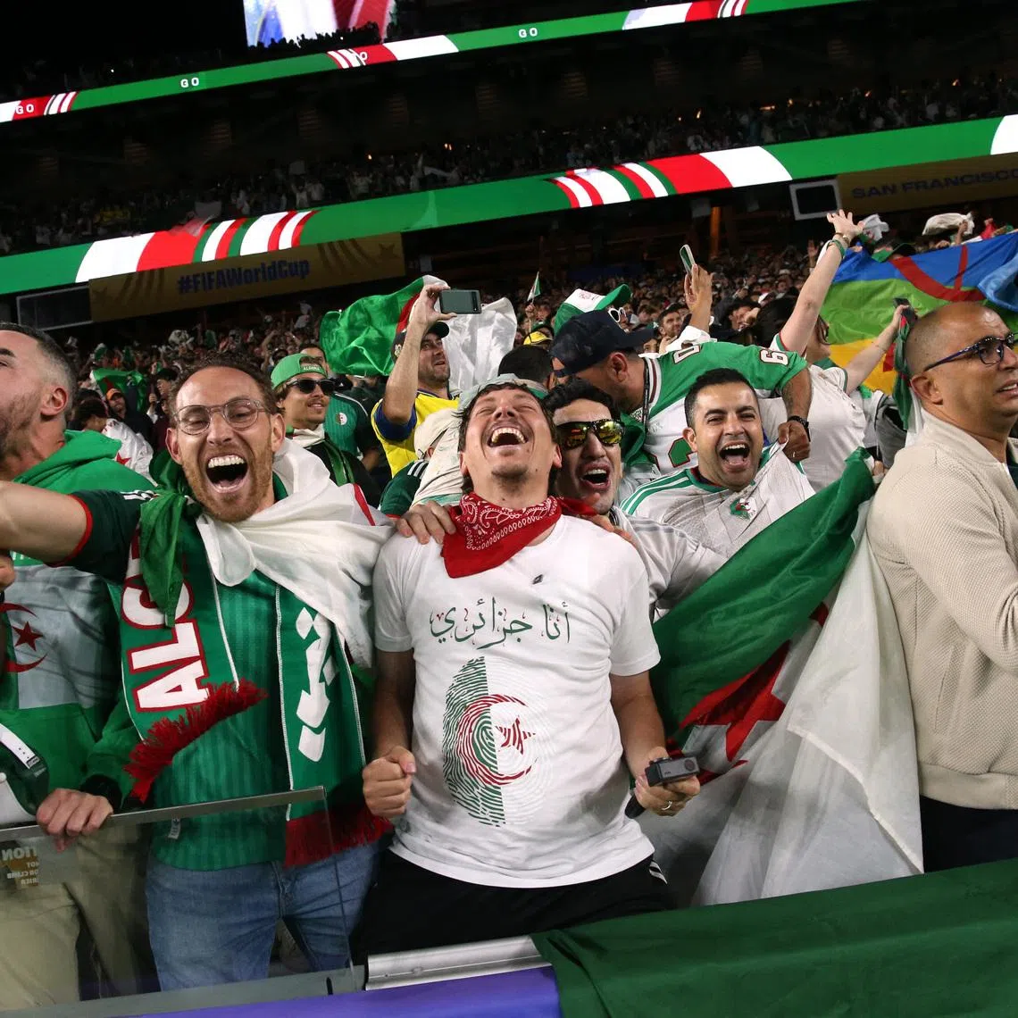 Soccer Football - FIFA World Cup 2026 - Group J - Jordan v Algeria - San Francisco Bay Area Stadium, Santa Clara, California, U.S. - June 22, 2026 Algeria fans celebrate in the stands after Amine Gouiri scores their second goal IMAGN IMAGES via Reuters/David Gonzales