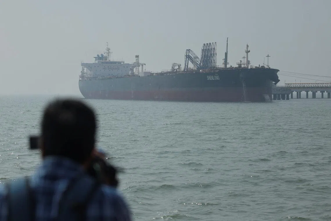 A tanker arrives at a port after transiting the Strait of Hormuz amid supply disruptions linked to the U.S-Israeli conflict with Iran, in Mumbai, on March 12.