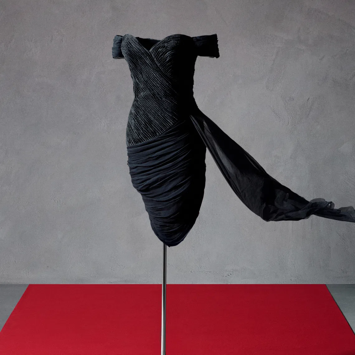 The black silk evening dress by Greek designer Christina Stambolian is estimated to fetch as much as £220,000 (S$377,050) when it goes on sale on Dec 9.