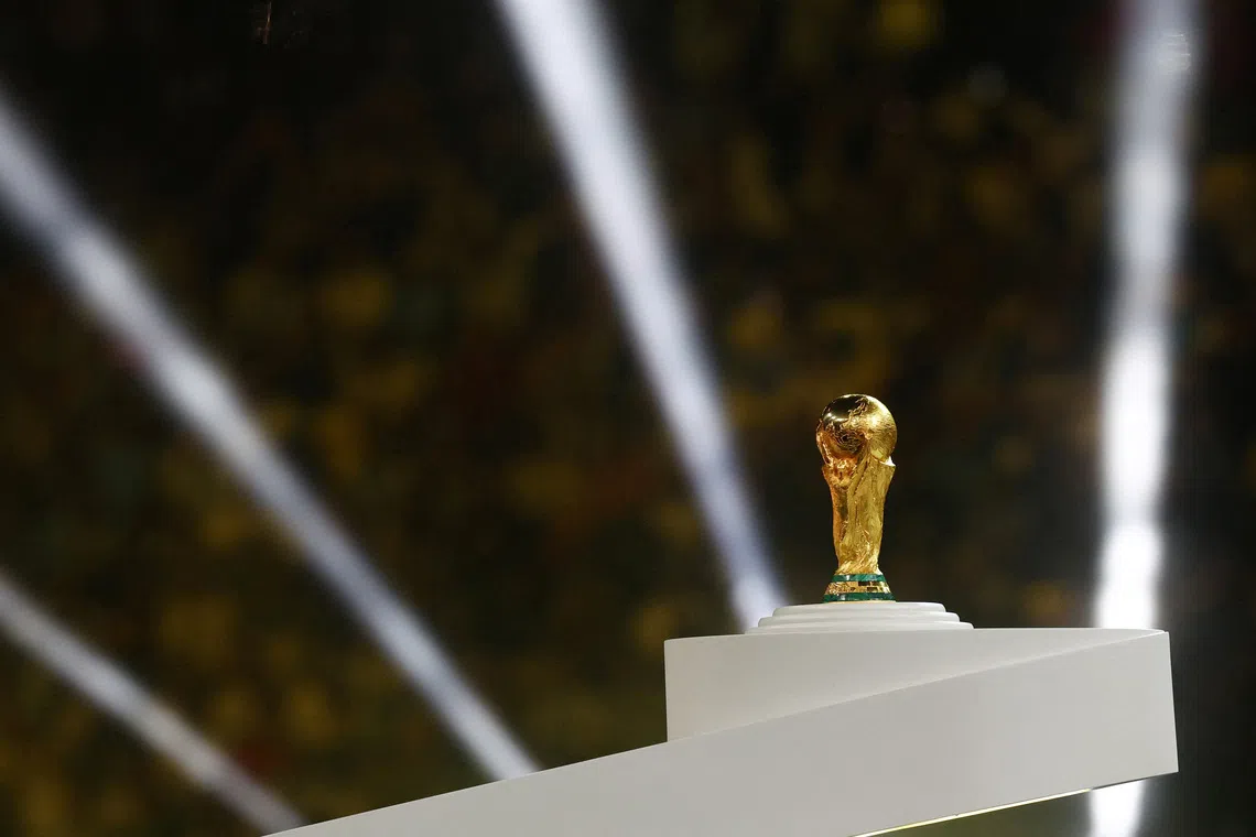 FILE PHOTO: Soccer Football - FIFA World Cup Qatar 2022 - Final - Argentina v France - Lusail Stadium, Lusail, Qatar - December 18, 2022 General view of the World Cup trophy on a plinth before the trophy presentation REUTERS/Kai Pfaffenbach/File Photo