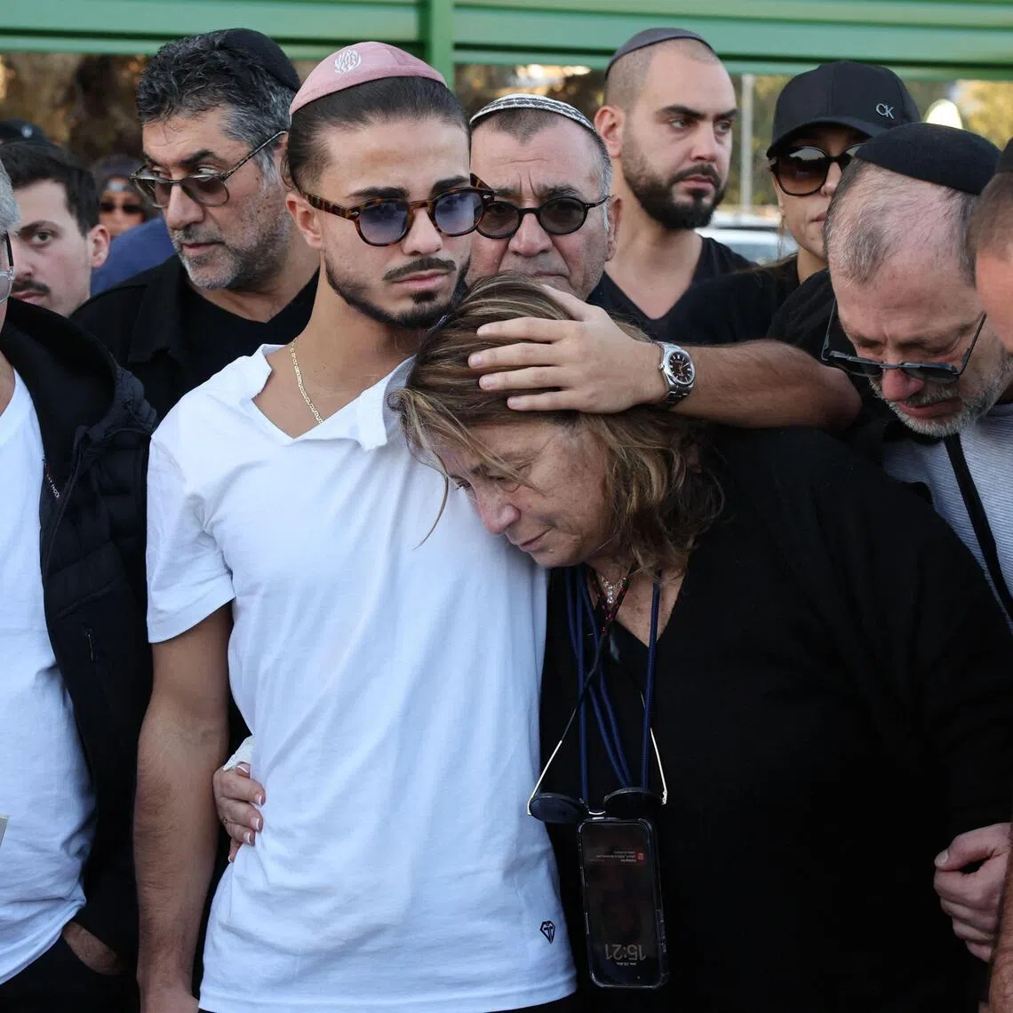 Relatives and friends of Mr Dan Elkayam, who was killed in the terrorist attack at Bondi Beach in Australia, mourn during his funeral at the Ashdod cemetery in southern Israel. 