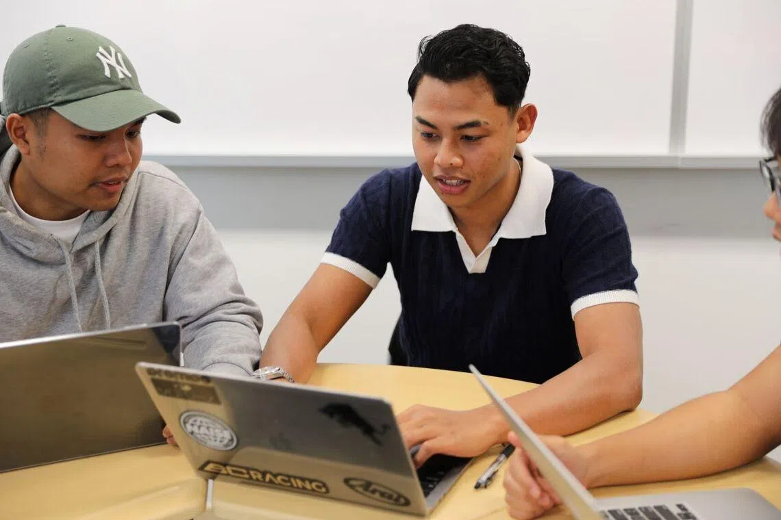 Muhammad Ezuwan with fellow officers in their diploma class at Temasek Polytechnic
