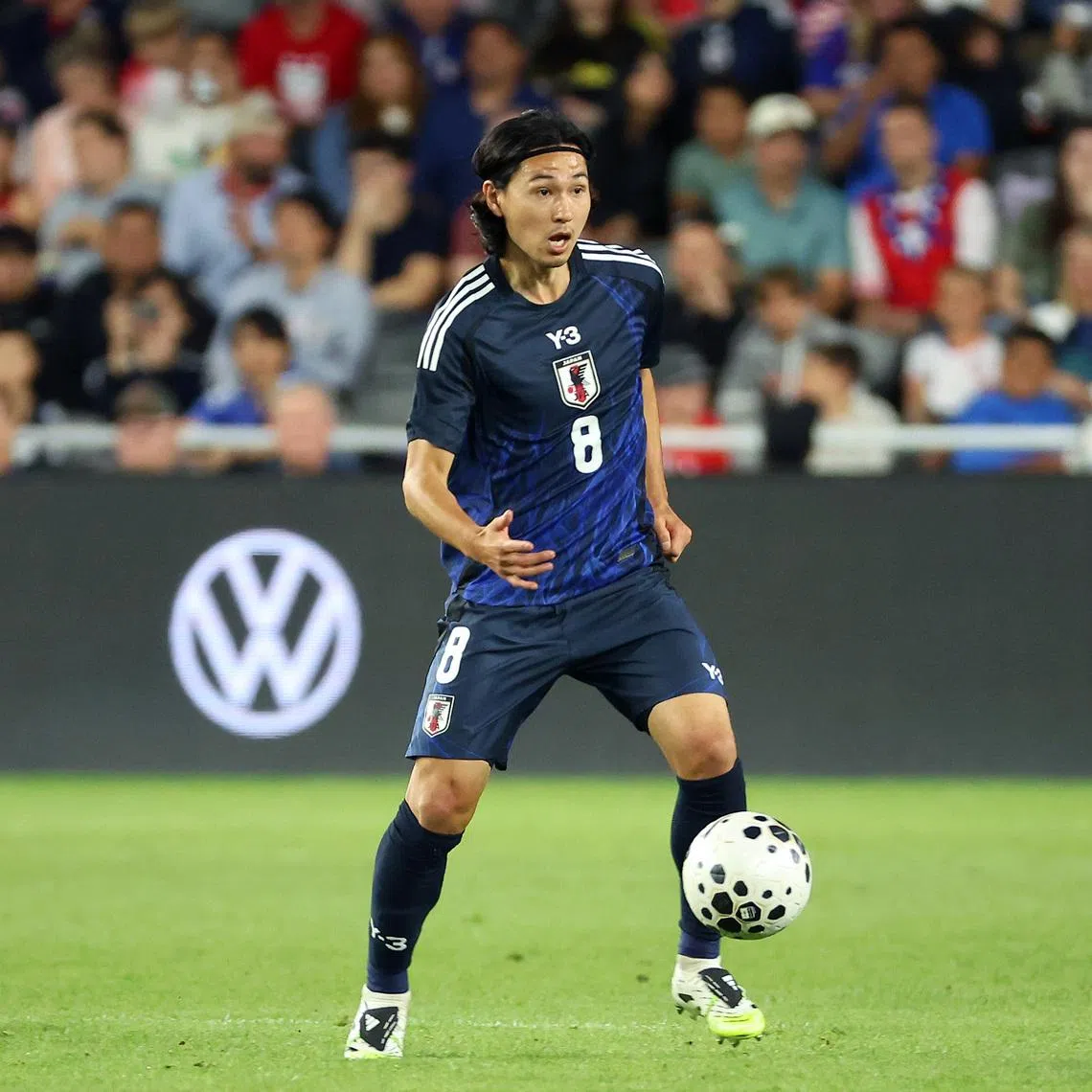 Sep 9, 2025; Columbus, Ohio, USA;  Japan midfielder Takumi Minamino (8) looks to pass the ball during the second half against the US Men's National Team at Lower.com Field. Mandatory Credit: Joseph Maiorana-Imagn Images