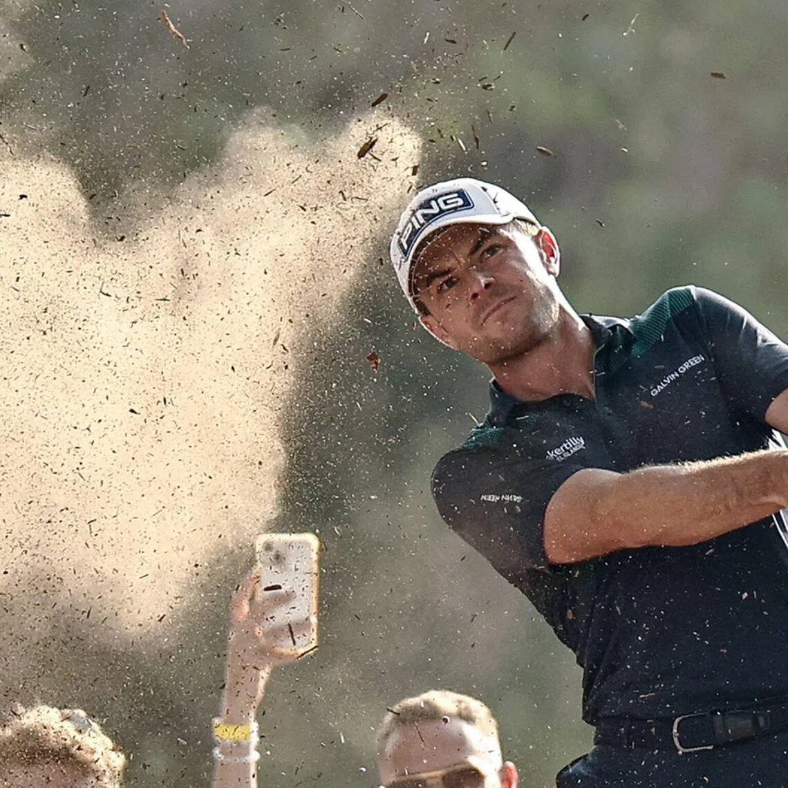 England's Laurie Canter plays a shot on the eighteenth hole during the final day of the 2025 DP World Tour Championship at Jumeirah Golf Estates in Dubai.