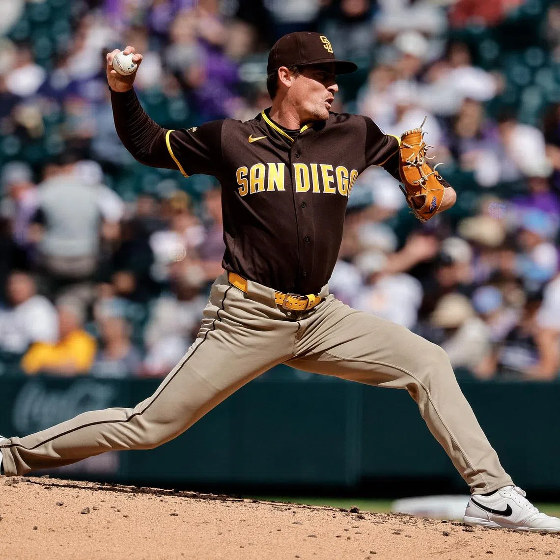 Apr 23, 2026; Denver, Colorado, USA; San Diego Padres relief pitcher Ron Marinaccio (97) pitches in the seventh inning against the Colorado Rockies at Coors Field. Mandatory Credit: Isaiah J. Downing-Imagn Images