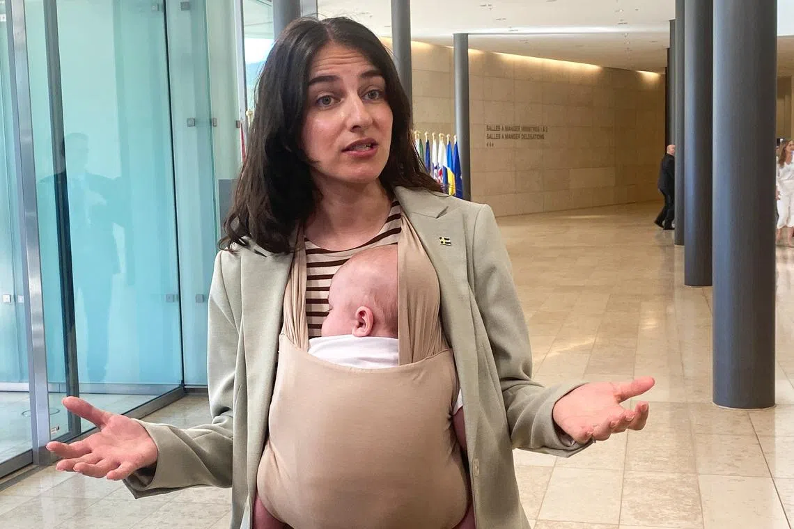 Swedish Environment Minister Romina Pourmokhtari brought her three-month-old son to an EU council meeting on June 25 to highlight the benefits of parental leave policies which do not force women to choose between work and family responsibilities.
