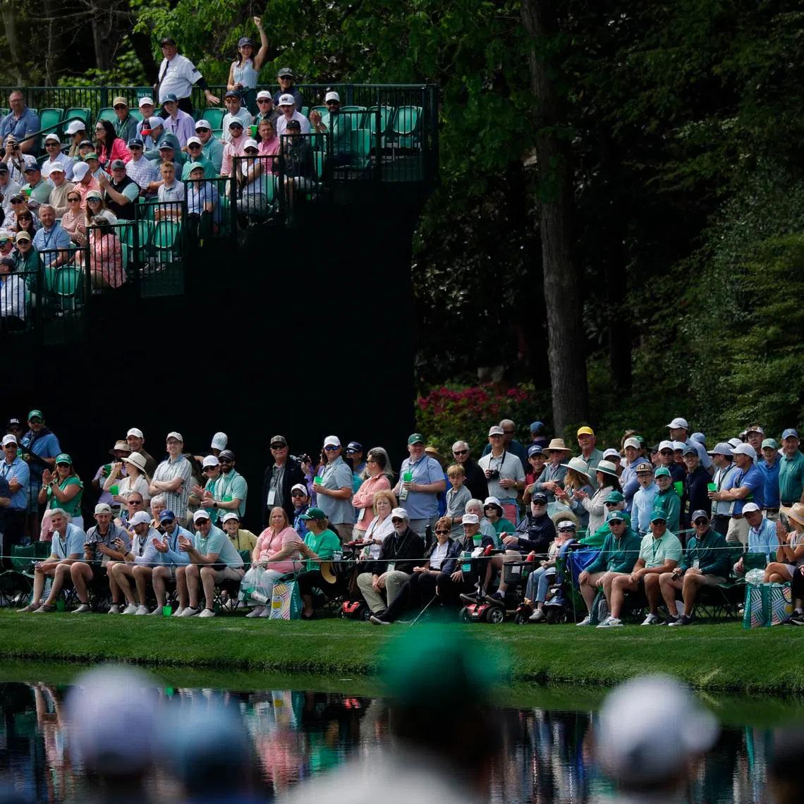 Golf - The Masters - Augusta National Golf Club, Augusta, Georgia, U.S. - April 7, 2026 General view of patrons on the 16th hole during a practice round REUTERS/Mike Blake