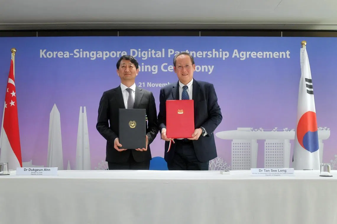 Second Minister for Trade and Industry Tan See Leng (right) and South Korea’s Minister for Trade Dukgeun Ahn signed the Korea-Singapore Digital Partnership Agreement on Nov 21, 2022.