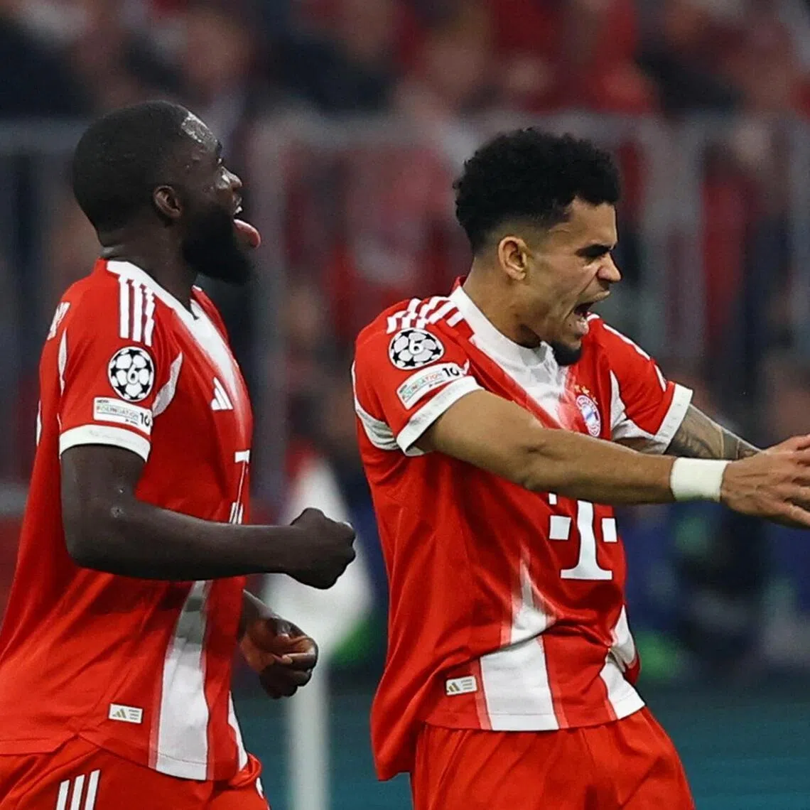Bayern Munich's Luis Diaz (right) celebrates scoring their third goal with Dayot Upamecano in the 4-3 Champions League quarter-final, second-leg win over Real Madrid at the Allianz Arena in Munich on April 15, 2026.