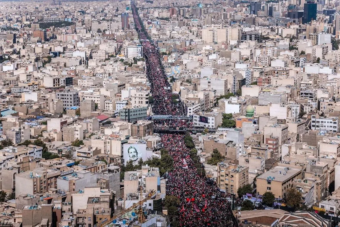 People attend a funeral procession for Iran's late Supreme Leader Ayatollah Ali Khamenei, who was killed on February 28 in Israeli and U.S. airstrikes, in Tehran, Iran July 6, 2026. Office of the Iranian Supreme Leader/ Handout via REUTERS ATTENTION EDITORS - THIS PICTURE WAS PROVIDED BY A THIRD PARTY. ISRAEL OUT. NO COMMERCIAL OR EDITORIAL SALES IN ISRAEL. NO ACCESS FOR ISRAELI MEDIA. NO USE BBC PERSIAN. NO USE VOA PERSIAN. NO USE MANOTO. NO USE IRAN INTERNATIONAL. NO USE RADIO FARDA. DIGITAL: NO USE BBC PERSIAN. NO USE VOA PERSIAN. NO USE MANOTO. NO USE IRAN INTERNATIONAL. NO USE RADIO FARDA TPX IMAGES OF THE DAY