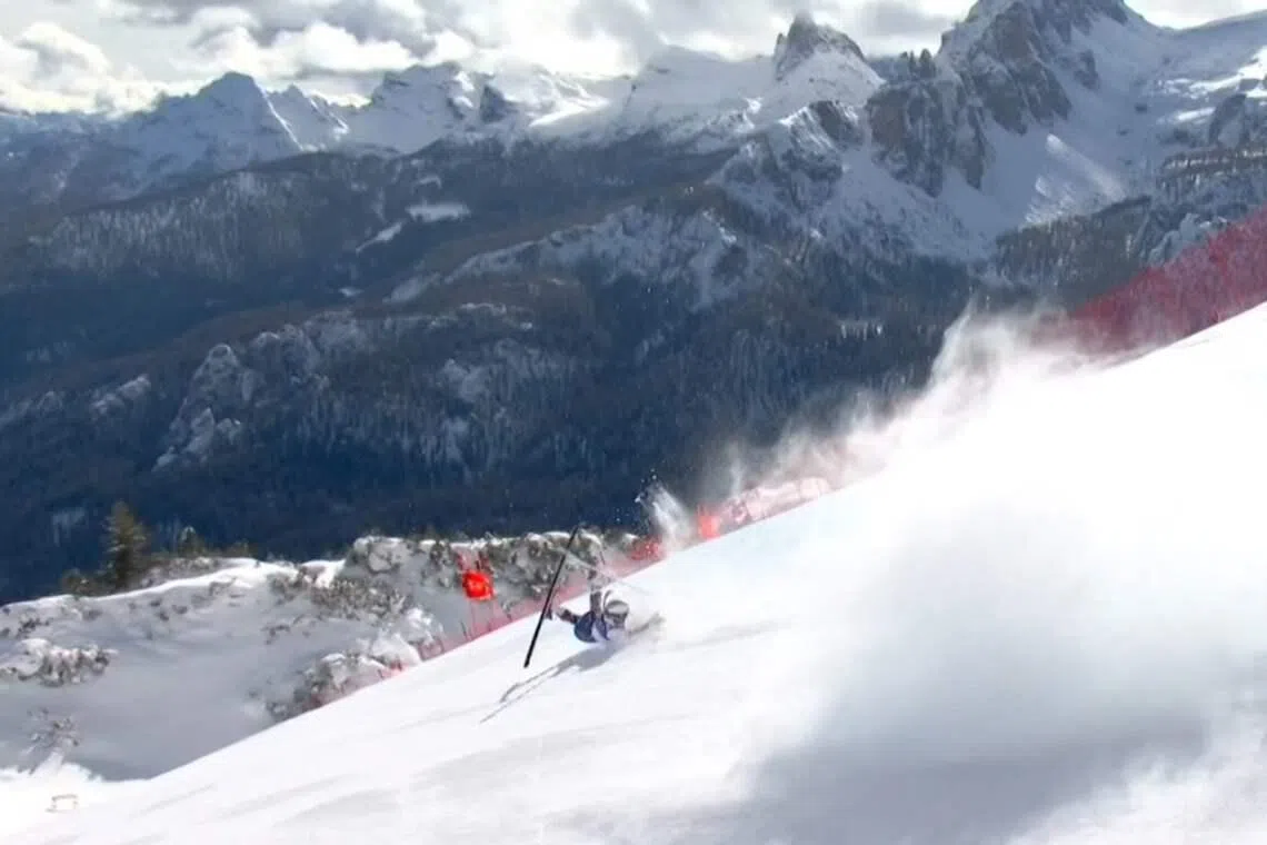 US skier Lindsey Vonn crashing during the women’s downhill race at the Winter Olympics on Feb 8. Sport can feel like an escape into an unreal world whose struggles are dramatic even if they rarely involve life and death, says the writer.