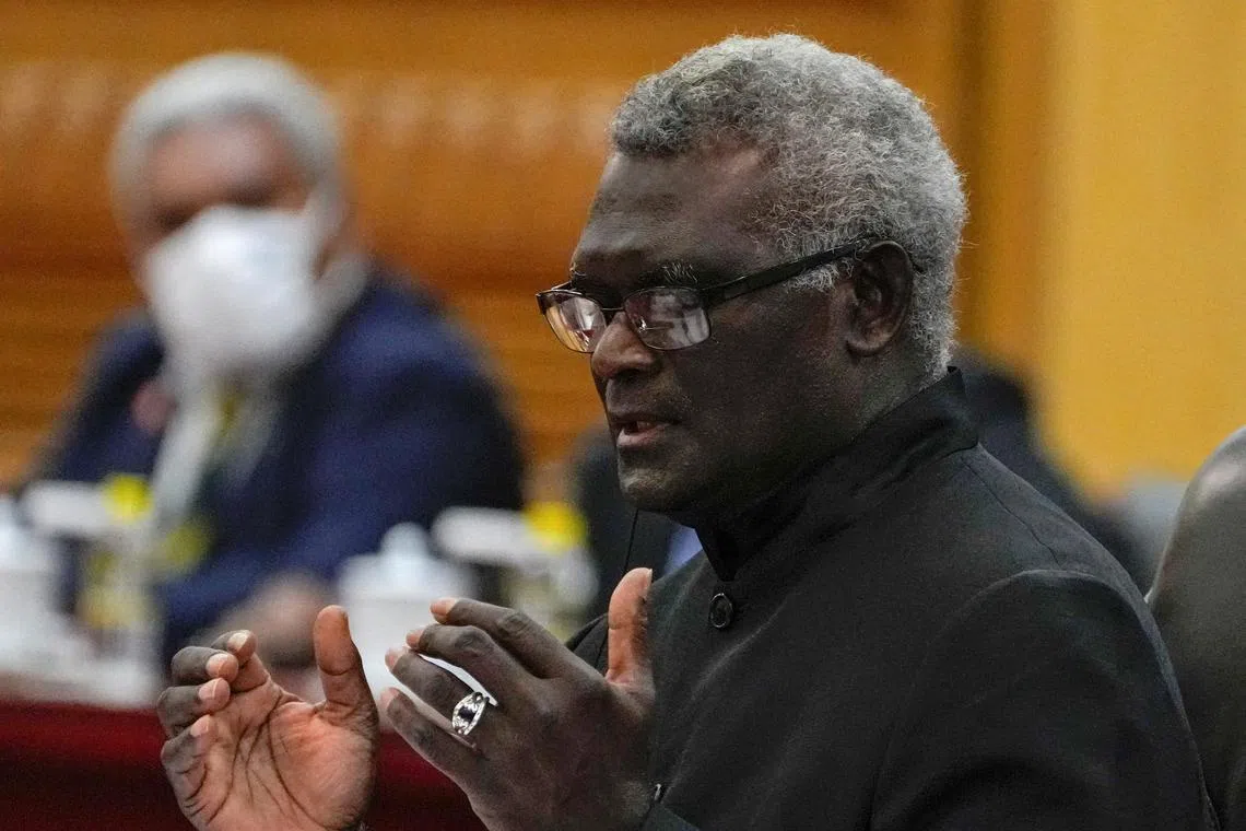 FILE PHOTO: Visiting Solomon Islands Prime Minister Manasseh Sogavare speaks during a bilateral meeting with his Chinese counterpart Li Qiang at the Great Hall of the People in Beijing, Monday, July 10, 2023.  Andy Wong/Pool via REUTERS/File Photo