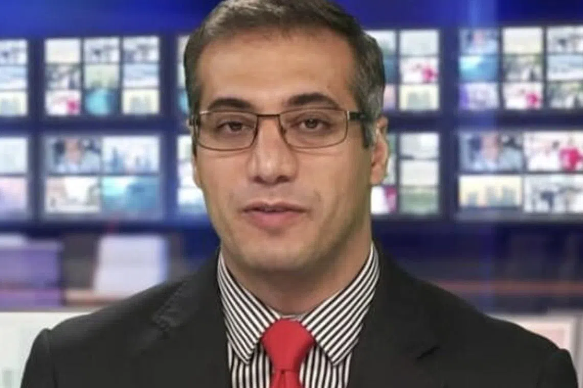 Reza Valizadeh's lawyer says the journalist was accused of working at a US-funded radio. 