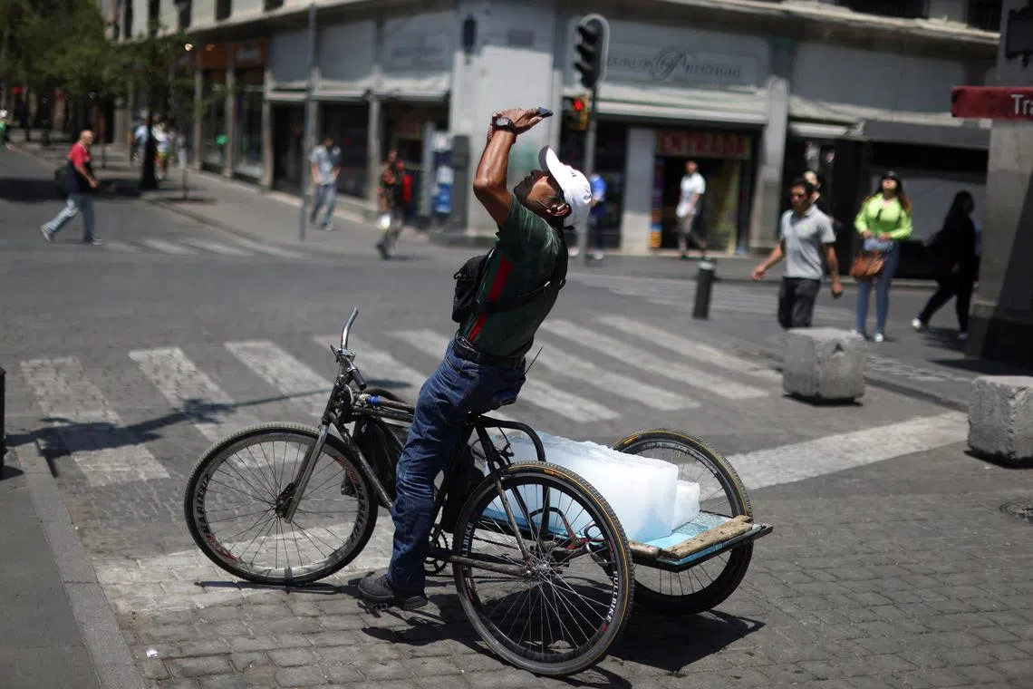A man stopping to look at the solar eclipse in Mexico City, on April 8, 2024. 