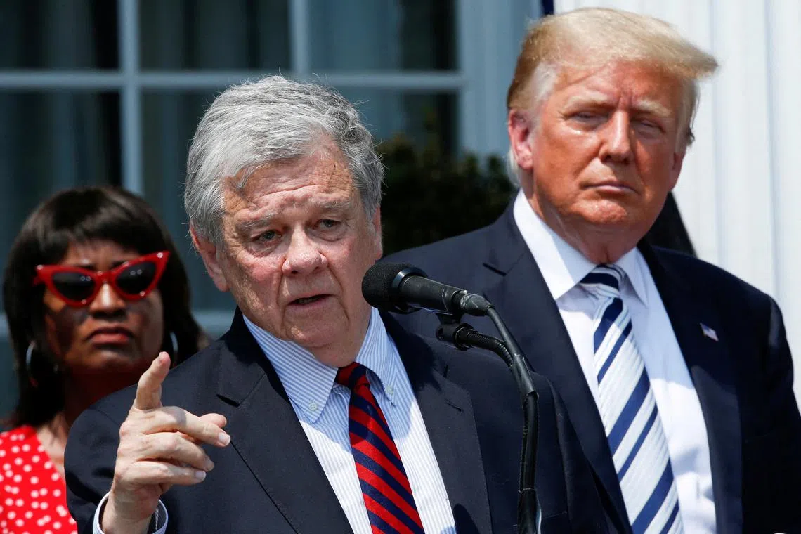 FILE PHOTO: Attorney John Coale speaks next to former U.S. President Donald Trump at Trump golf club in Bedminster, New Jersey, U.S., July 7, 2021.  REUTERS/Eduardo Munoz/File Photo