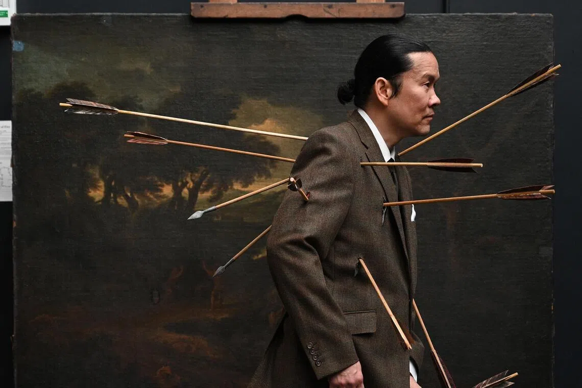 ohming - Singaporean artist Ming Wong, pierced with arrows, in a still from his film 'Dance of the sun on the water | Saltatio solis in aqua’, created as part of his residency with the National Gallery in London. 

Photo credit: Ming Wong. ONE TIME USE
for Life