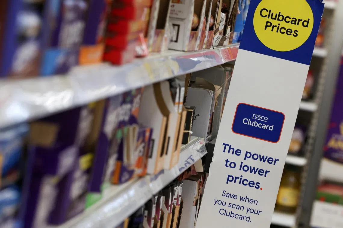 Clubcard branding is seen inside a branch of a Tesco Extra Supermarket in London, Britain, February 10, 2022.